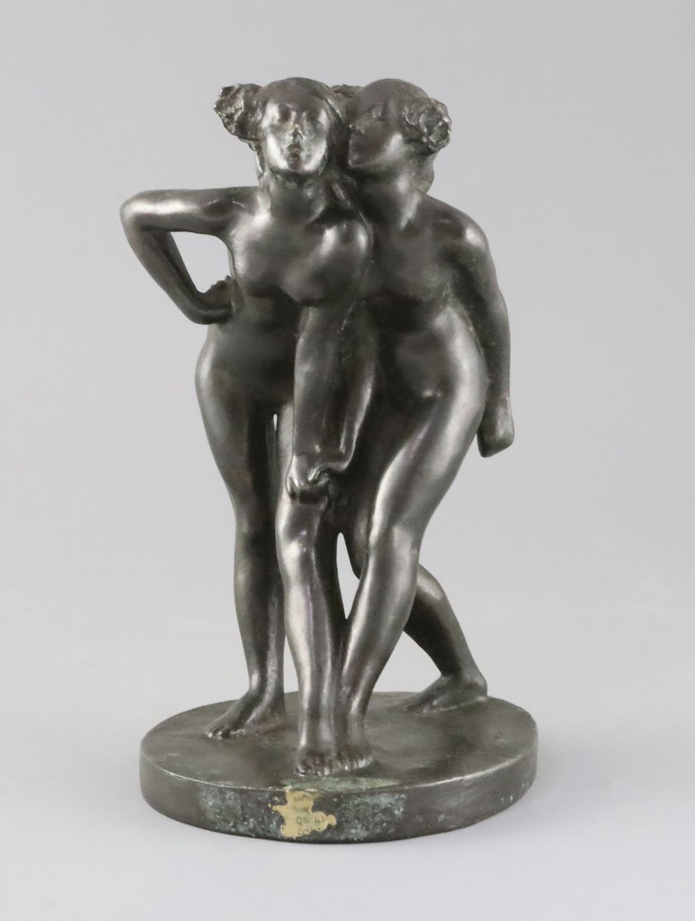 After Pierre-Auguste Renoir. A French lost wax bronze group of embracing maidens, bears signature, height 23cm